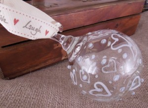 glass bauble with blue and white hearts and spots
