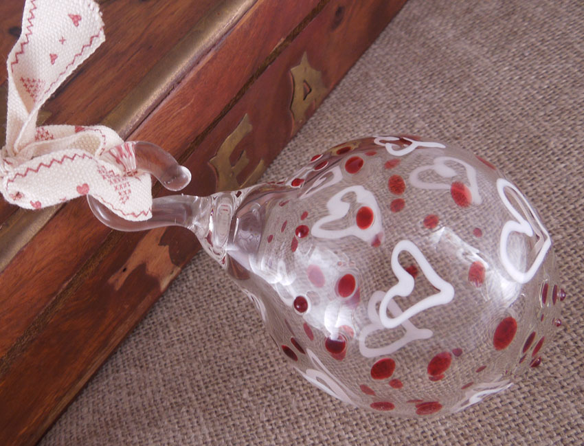 glass bauble with red dots and white hearts