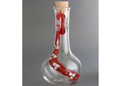 Glass oil jugs, flower trail with cork stopper
