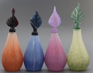 Hand blown glass bottles with twisted leaf stopper